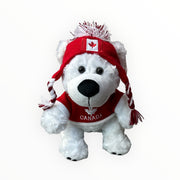 Canadian Polar Bear stuffed animal wearing sweater and toque, with Canada and maple leaf themed designed toy